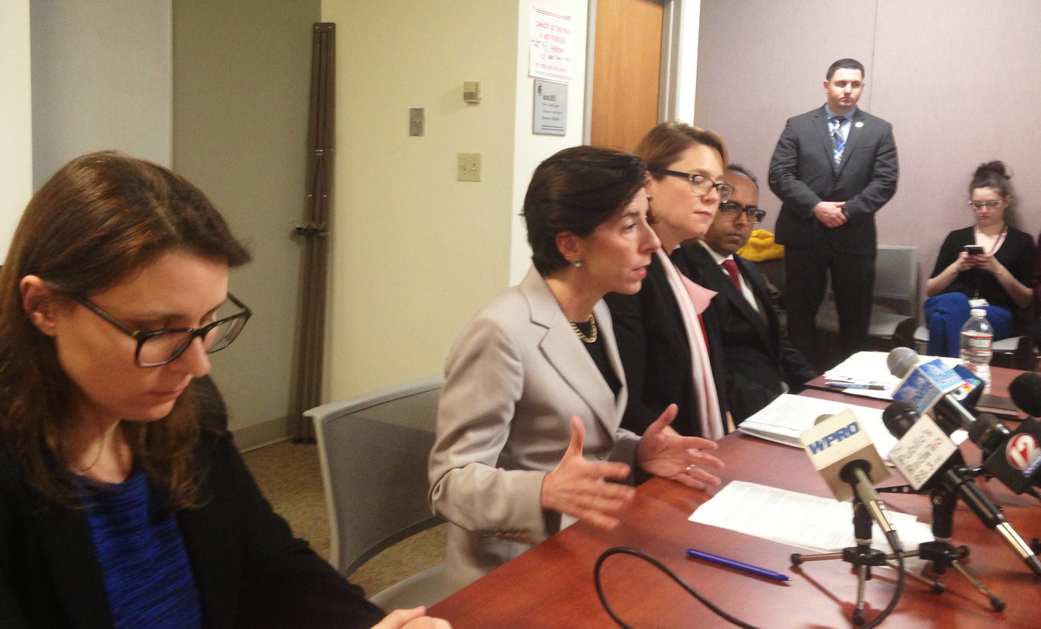 Gov. Gina Raimondo and her team explain the reasons behind the decision to renew the contract with Deloitte at a March 15 news conference.
